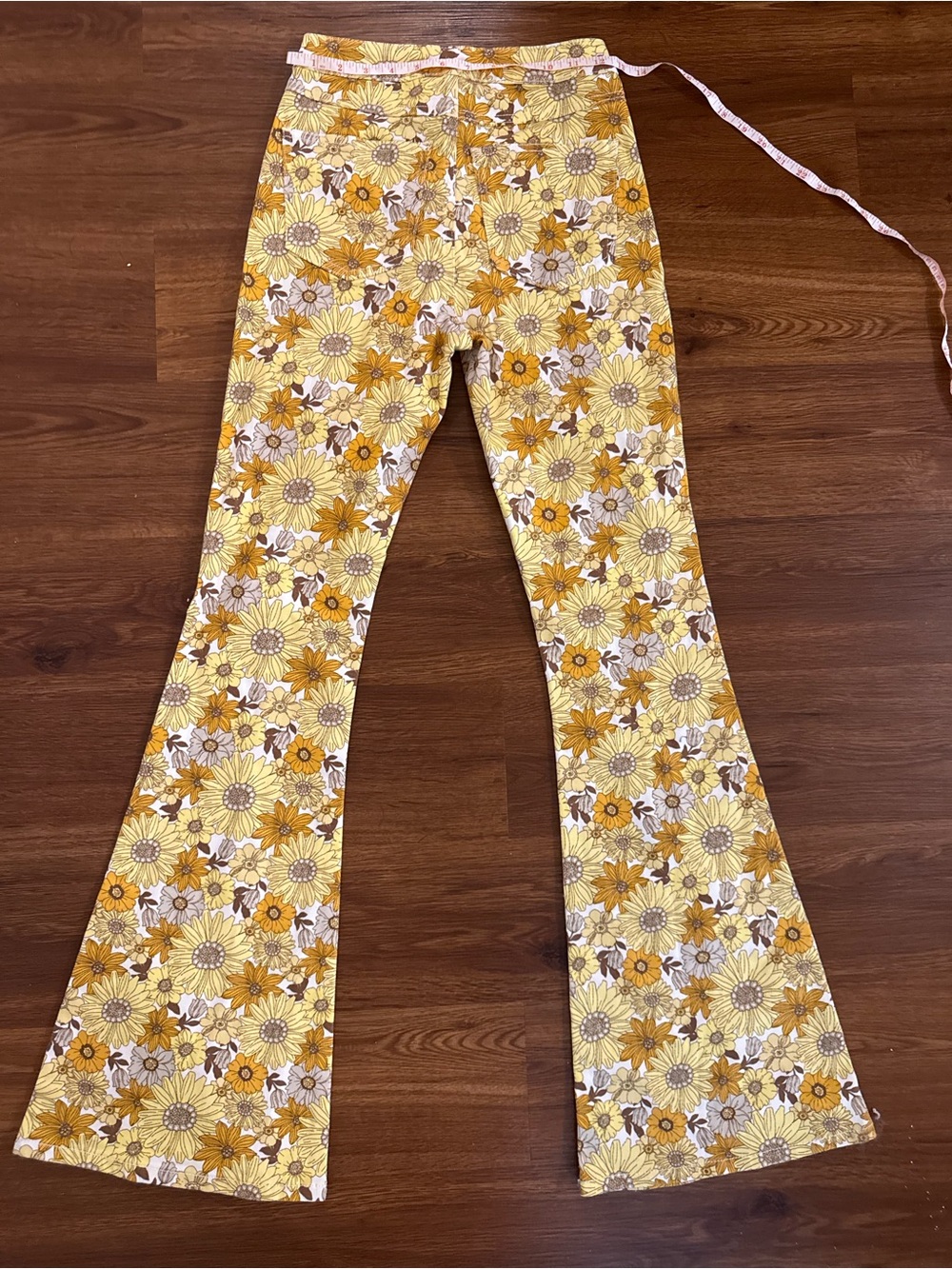 Forever 21 women’s Yellow Floral Flare jeans